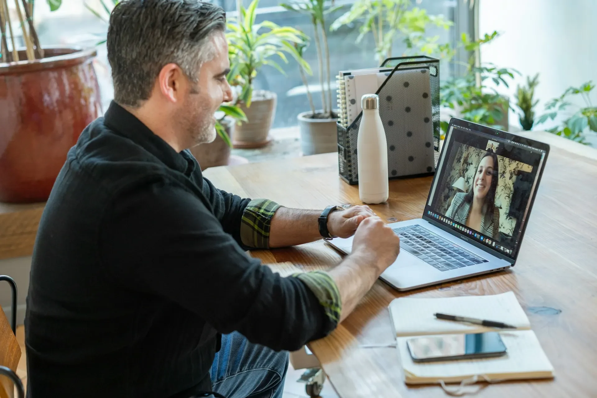 A clinician meeting with a client by video call